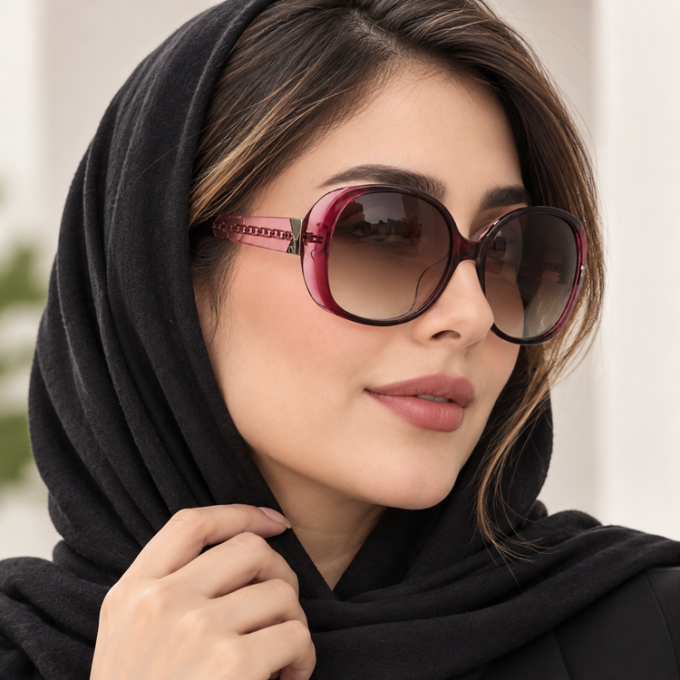 عینک آفتابی زنانه هلن کلر مدل 1319 با فریم زرشکی صورتی و عدسی گرادیانت قهوهای